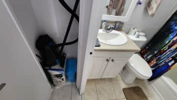 Bathroom and Vacuum/Litter Closet