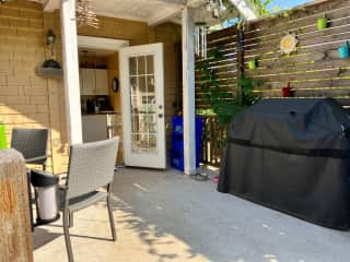 Balcony off the kitchen. West facing and has propane BBQ and fire table.