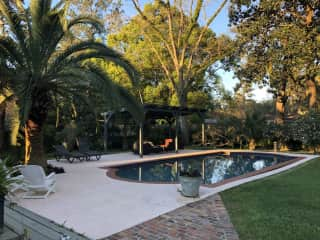 Backyard with a pool and sitting area