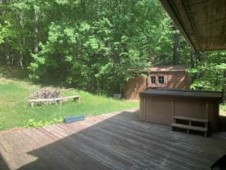 Hot tub and fire pit (rarely used) as well as storage shed.