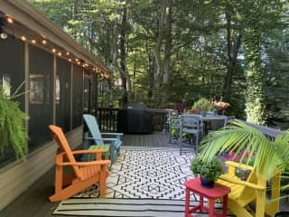 The back deck looks down into the woods and to the north you an see just a corner of the golf course