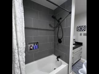 Guests bath tub and shower