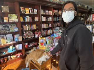 Just petting a friendly cat at the local bookstore.