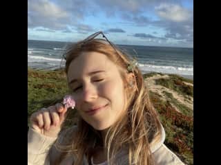 It’s me in Portugal enjoying the ocean coast and the sun!