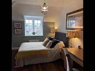 Your dedicated room with TV and shutters.
Suitcase space in the next room!