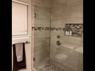 Large shower with rain showerhead in your bathroom. There is also a garden tub in the master bath you can use, as well.