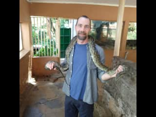 Just showing off with a big snake. (I have had reptiles and snakes before but not this big!)