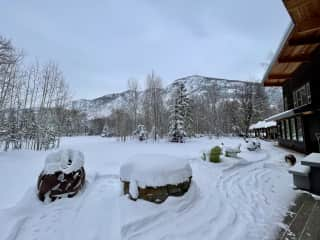 Front  porch to yard, looking out a mountains