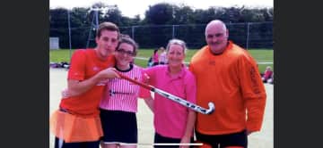 My husband and two kids all play hockey. Old photo, put on a few pounds since then but, I still play