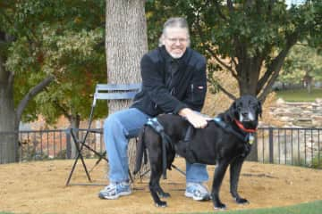 David traveling through Oklahoma during our elderly Labrador's last year.