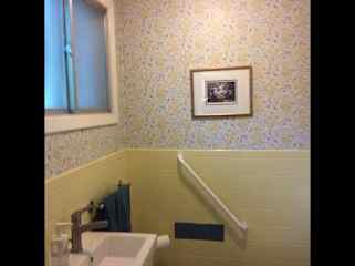 Two piece bathroom on lower level close to the guest room