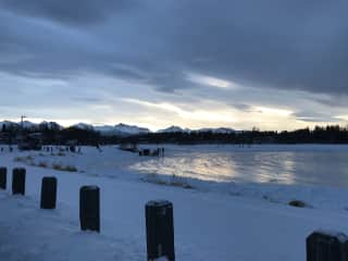 View of the mountains and the lagoon in the winter. Ice skating on the lagoon is a must!