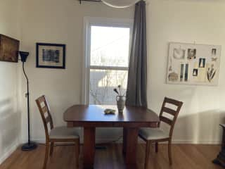 Dining table. There are two other matching chairs.