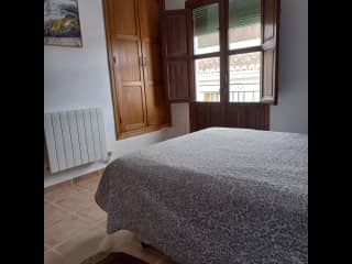 Sitters' bedroom with small balcony