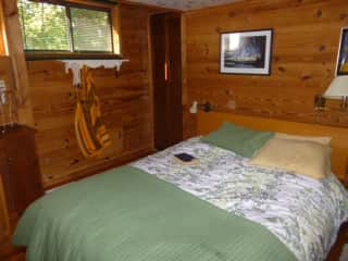 Guest room upstairs  is a queen bed. There is a half bath upstairs as well.