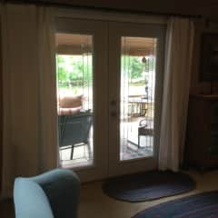 French doors in living room looking to front porch