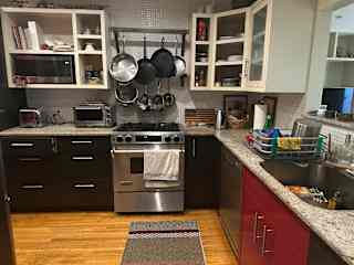 Kitchen with ample space for two people to prepare a meal.