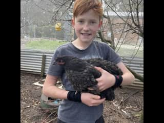 Asher with one of our hens