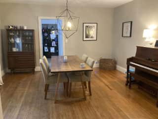 Dining room with acoustic piano.