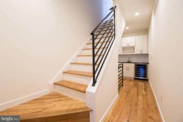 Stairs leading up to roof + wet bar