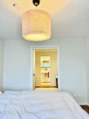 View from sitter bedroom through sitting area to ensuite bathroom