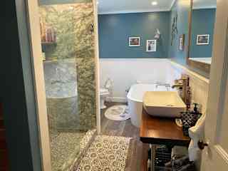 Bathroom with large shower and soaking tub