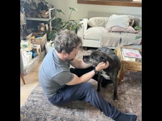 Chris with one of our most senior dogs, Maya! Maya required specific meds for her liver and frequent bathroom trips. We strive to ensure older pets get all they need to have a comfortable, stress free staycation.