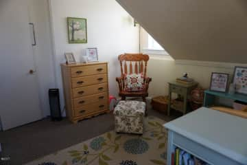 Small bedroom/kids room; currently has a full-size floor bed