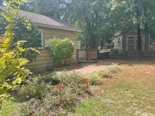 There is also parking on the driveway to the right side of the house.