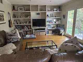 Comfy den for lounging and TV viewing.