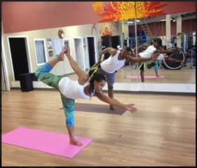 Enjoying  teaching  Dancers asana to a friend Yoga class . Canada.