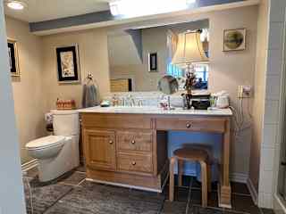 Full bath with walk in shower.