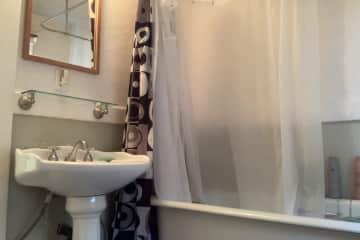 This is the bathroom with clawfoot bathtub.  The toilet is in a separate water closet.