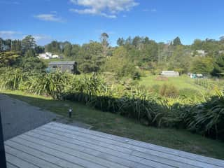 This is the view from our front deck. Most of our gardens and ponds are on the far side of the black barn (our B&B). You can see the shed, tunnel house and chook city (New Yolk and Chickago)on the right