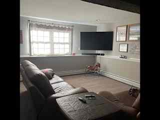 Downstairs living room, great for movie night!