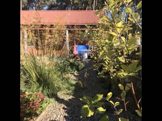 The walled garden and swing seat. A sunny spot for an afternoon snooze.