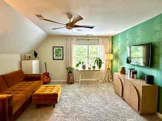 This is where you will stay!  A spacious guest bedroom with a designer queen-size sleeper sofa and ottoman from Article.