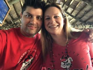 Ben and Valerie cheering on the UGA bulldogs football team