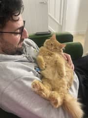 Josh holding Charlie like a baby!