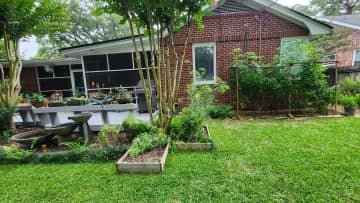 Back deck, screen porch.
Small veggie and herb gardens.