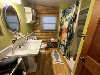 Main floor bathroom with tub