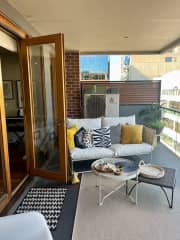 Outdoor private balcony. 
Tokyo LOVES it out here and she's well-behaved WITH supervision
but CANNOT be left unattended or she will try to leap to neighbouring balcony which is VERY UNSAFE.