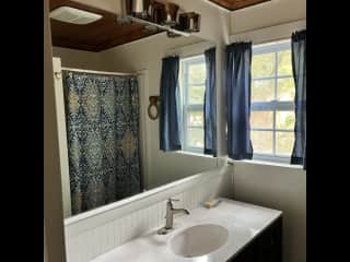 Ennsuite bathroom with walk in shower.