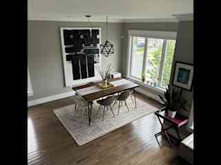 Dining room view from the stairs. Enough room for six at the table.