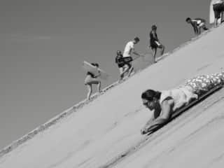Sarah sandboarding in NZ