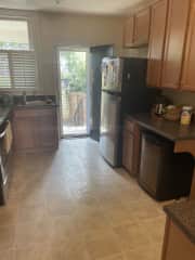 Kitchen with door to backyard