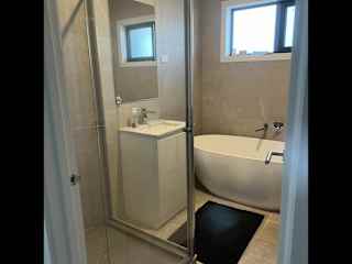 Upstairs bathroom with large bath