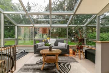 Enclosed sunroom that is spectacular for day, night, workouts, morning coffee, bird watching!