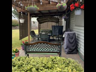 Back patio with fire pit and tv