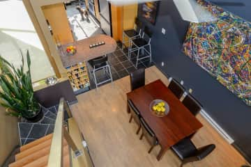 Dining room and now an electric piano is beside the stairs.